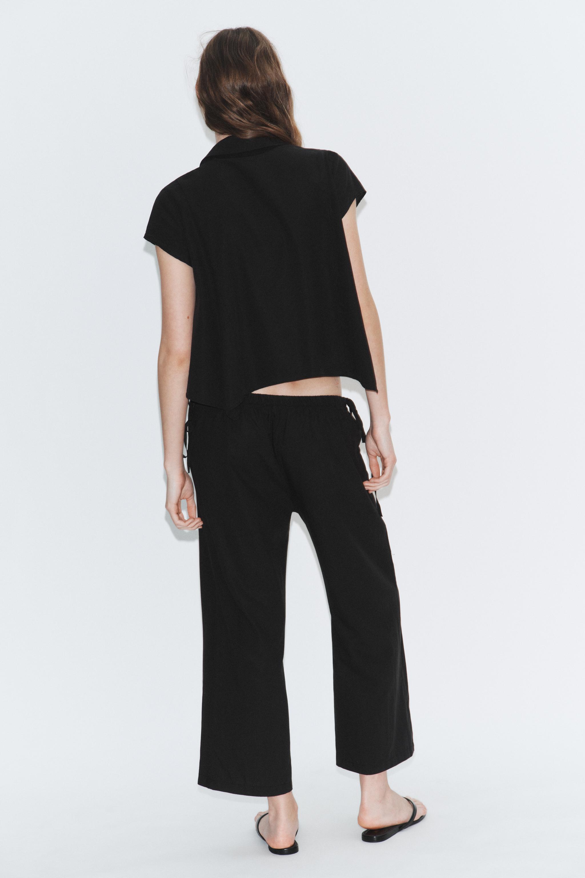 TIED ANKLE-LENGTH FLOWY PANTS